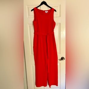 Fitted on top, wide leg red Tahari ASL jumpsuit. Handy side pockets. Size 12.
